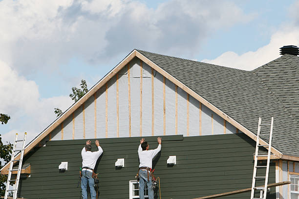 Professional Vinyl Siding technician working in Burlington, MA